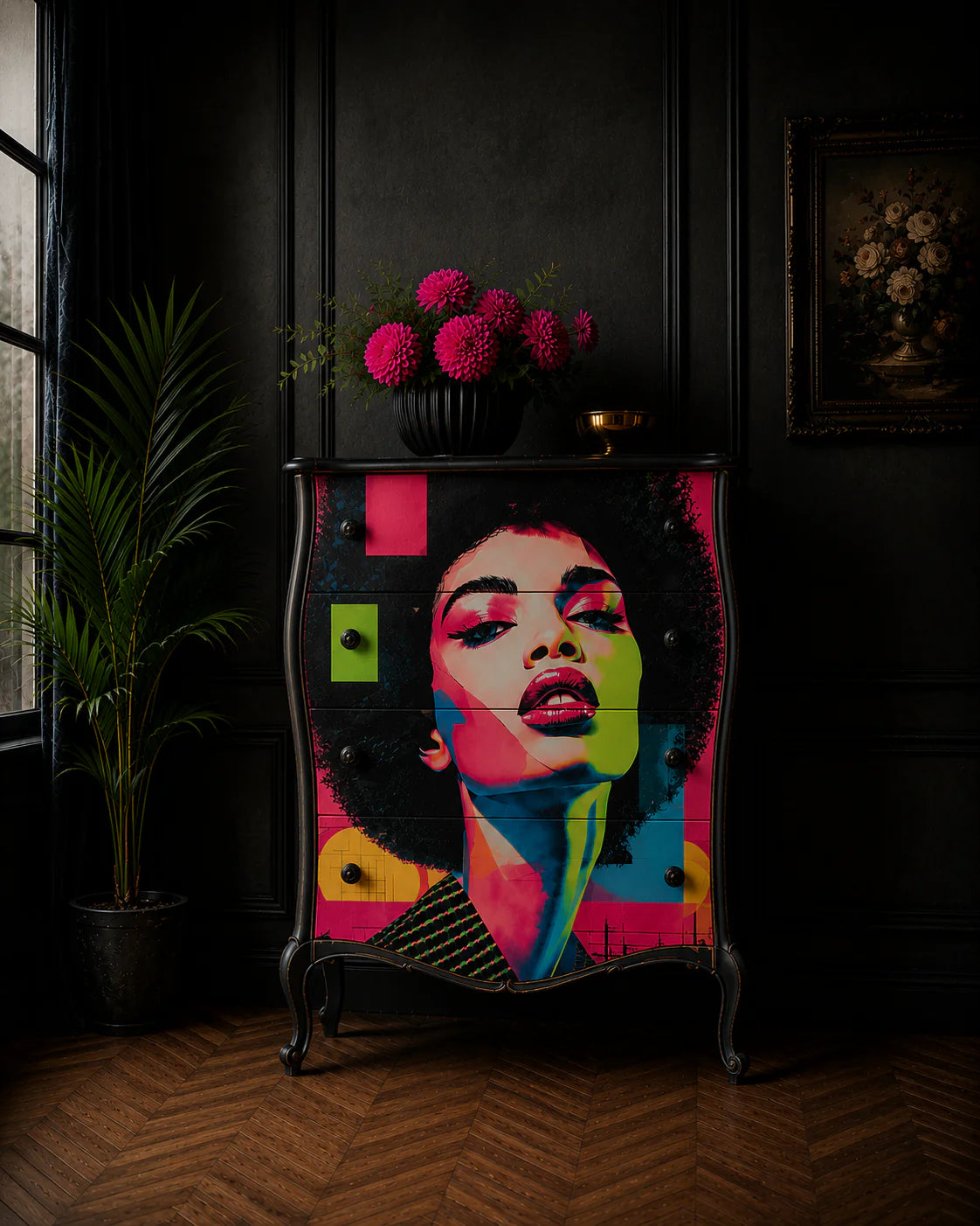 Cómoda bombeada negra restaurada con papel decoupage Pop Frequency de Mint by Michelle — retrato femenino pop art en colores neón sobre mueble oscuro en salón dramático con flores fucsia