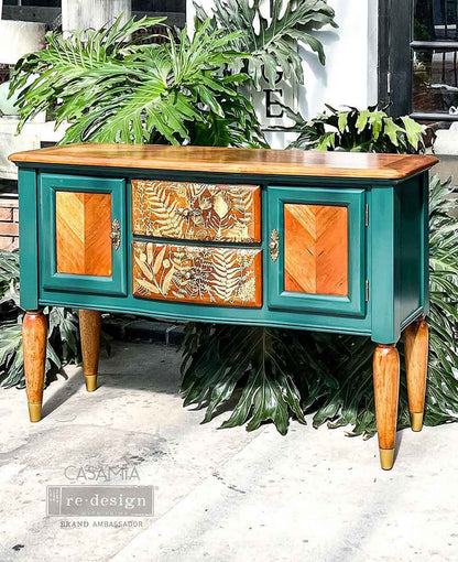 Transferencia decorativa Foliage Finesse Kacha en cómoda alta azul teal restaurada - helechos y follaje dorado en cajones - Re-Design with Prima
